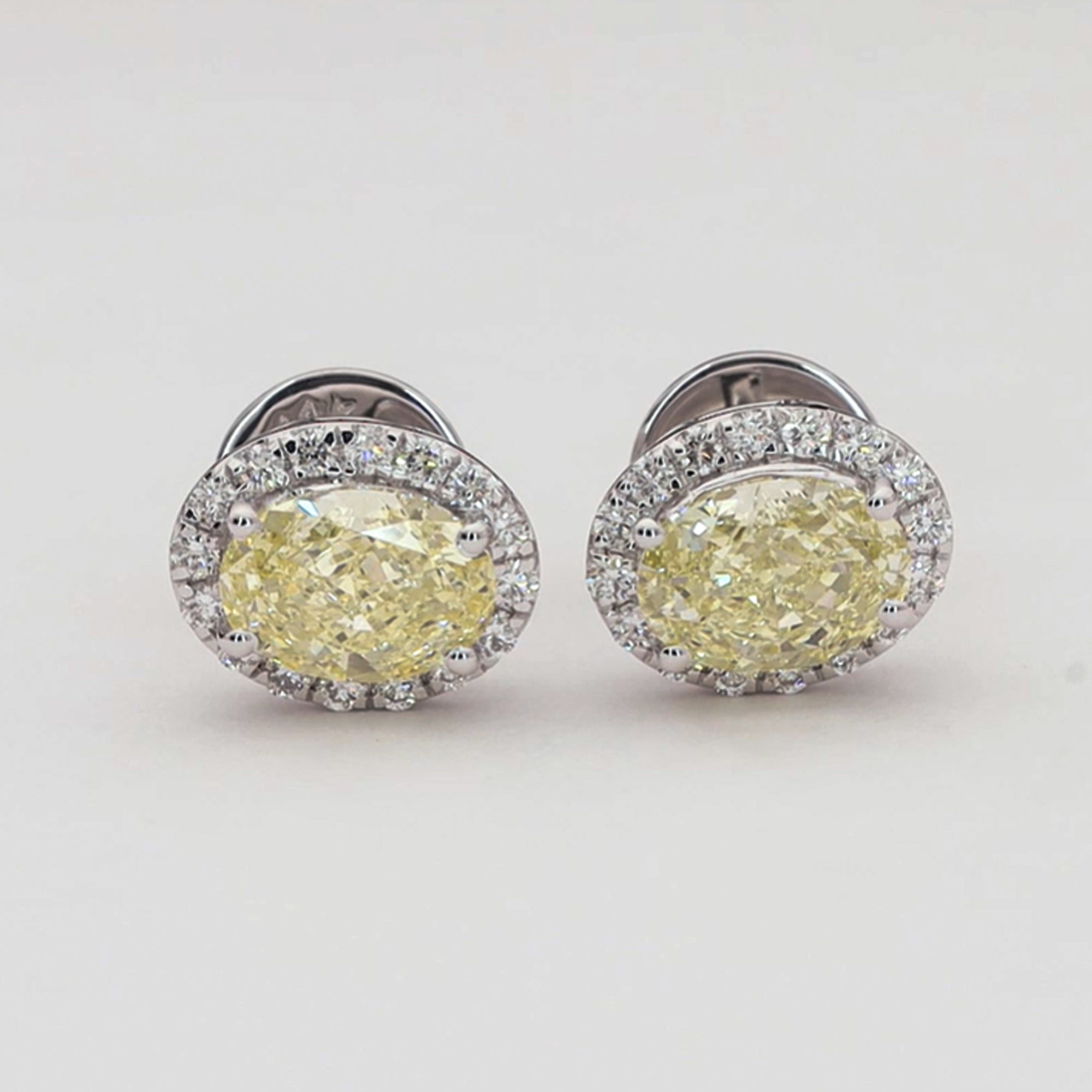 Fancy Yellow Oval Halo Earrings
