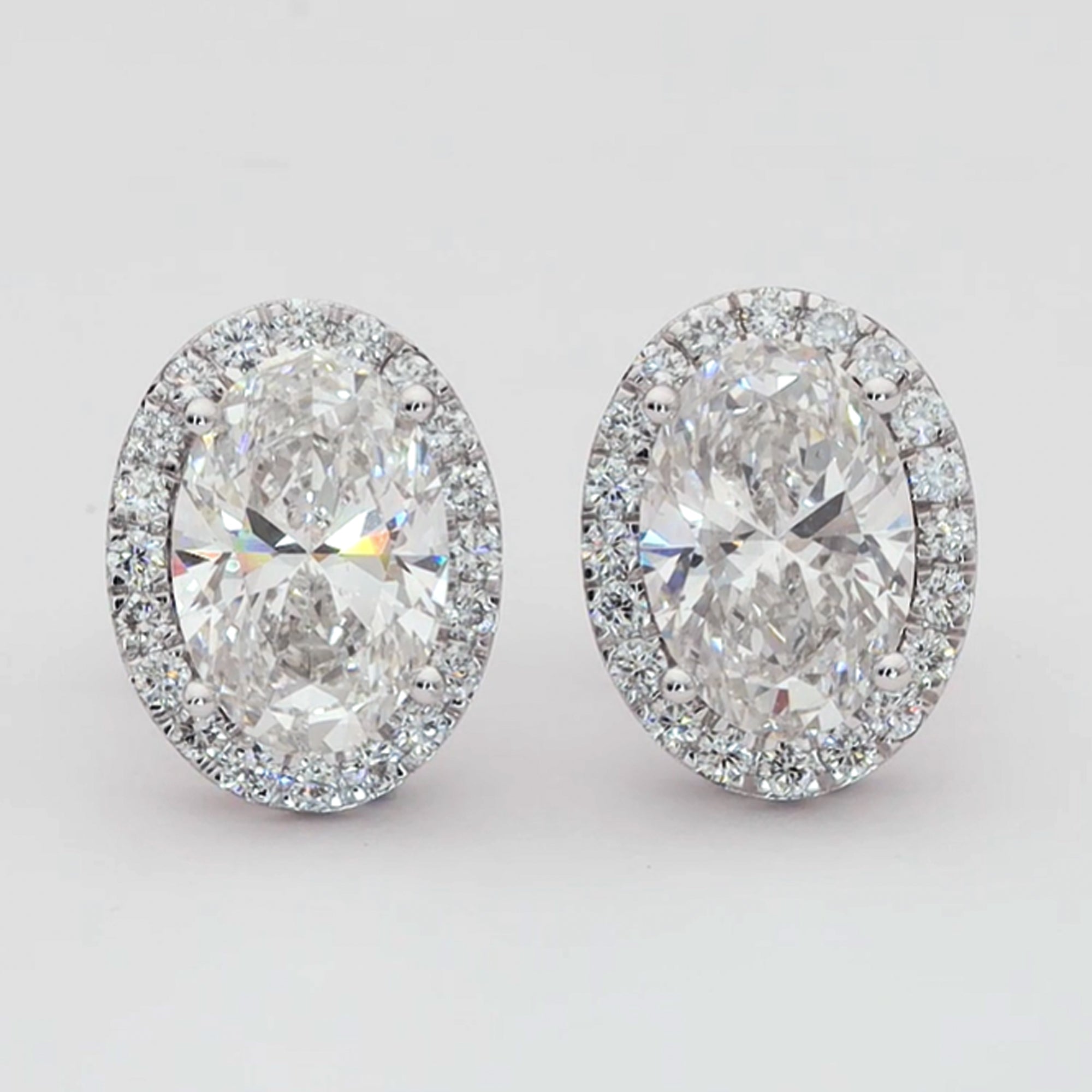 Infinite Oval Halo Diamond Earrings