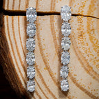 Glimmering 6 Stone Oval Dangle Earrings