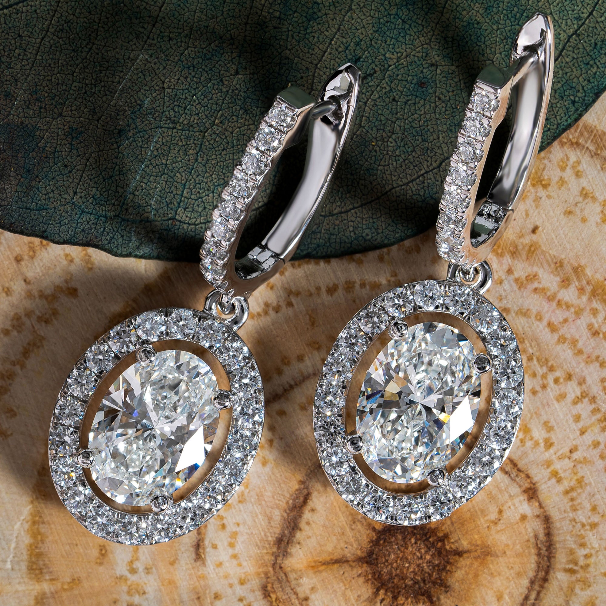 Dazzling Halo Oval Drop Earrings