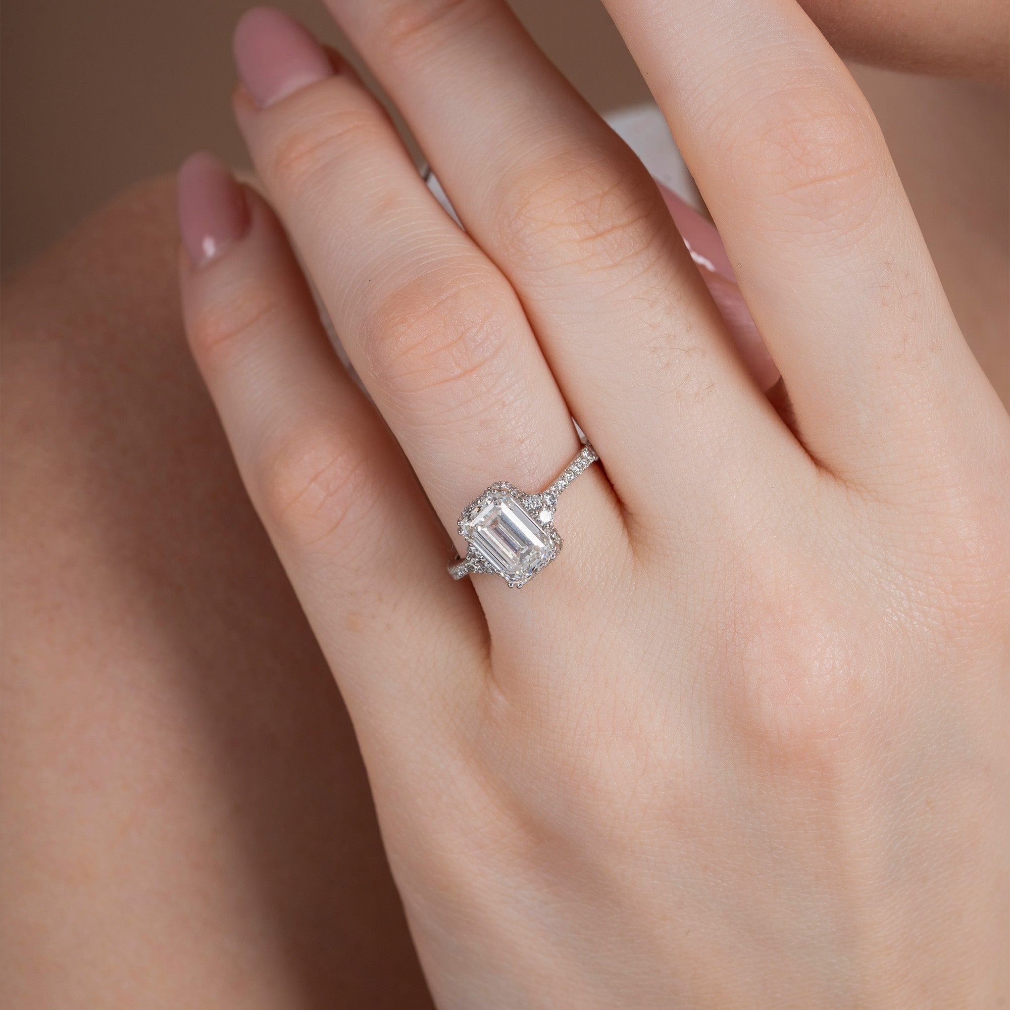 Blooming Emerald Halo Solitaire Ring