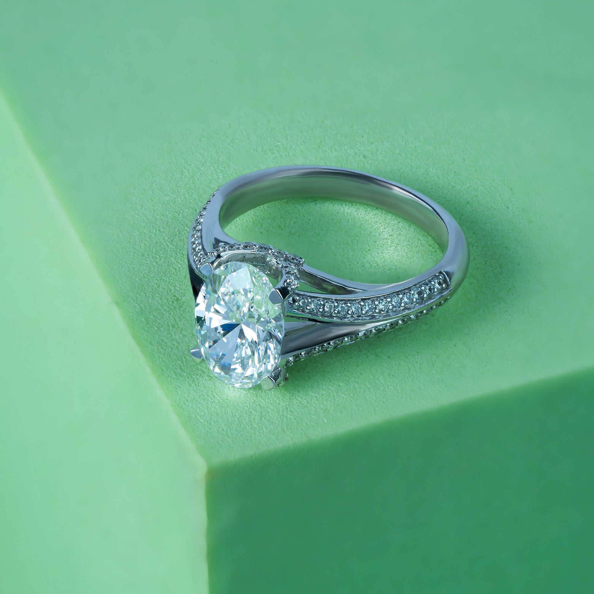 Split Shank Oval Side Stone Engagement Ring