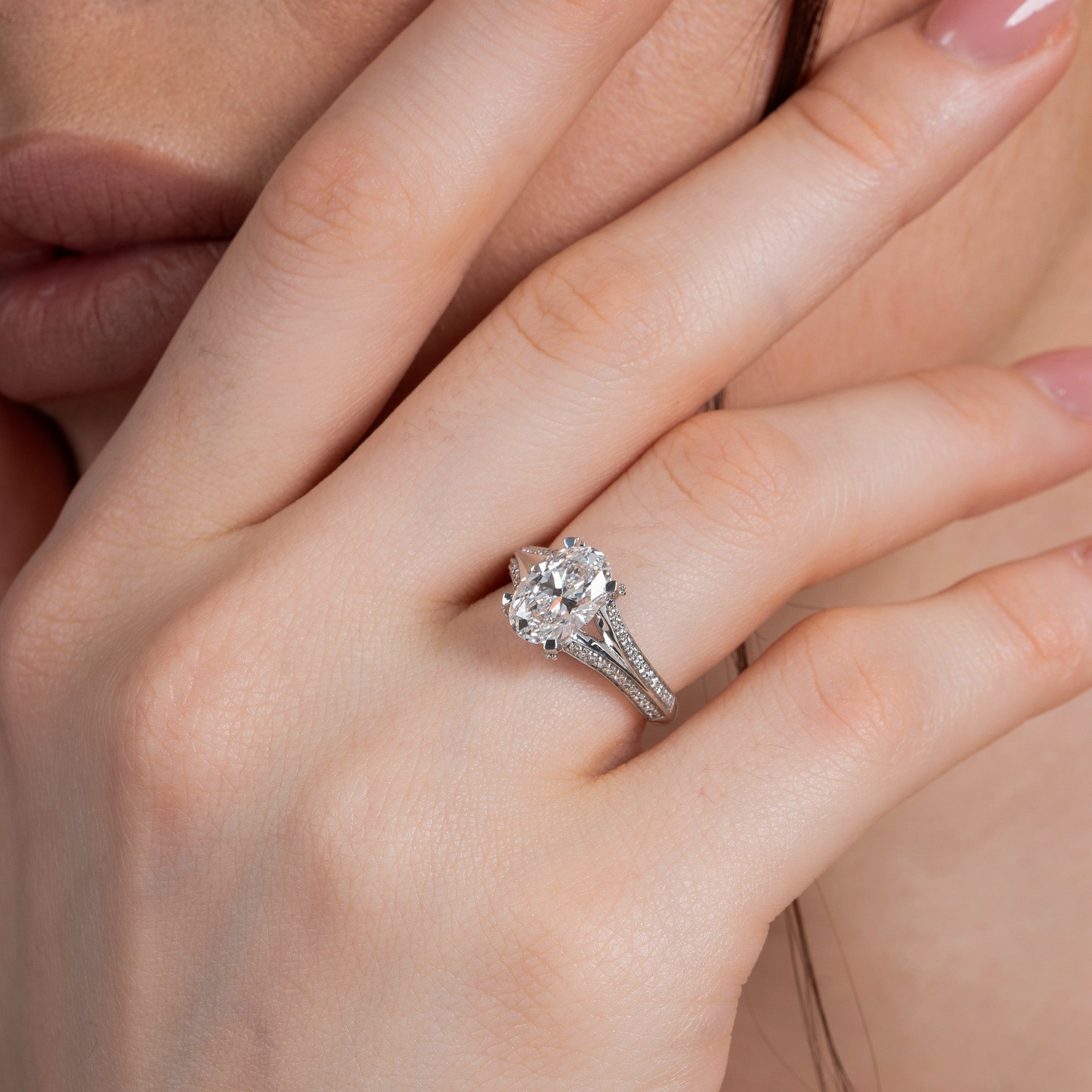 Split Shank Oval Side Stone Engagement Ring