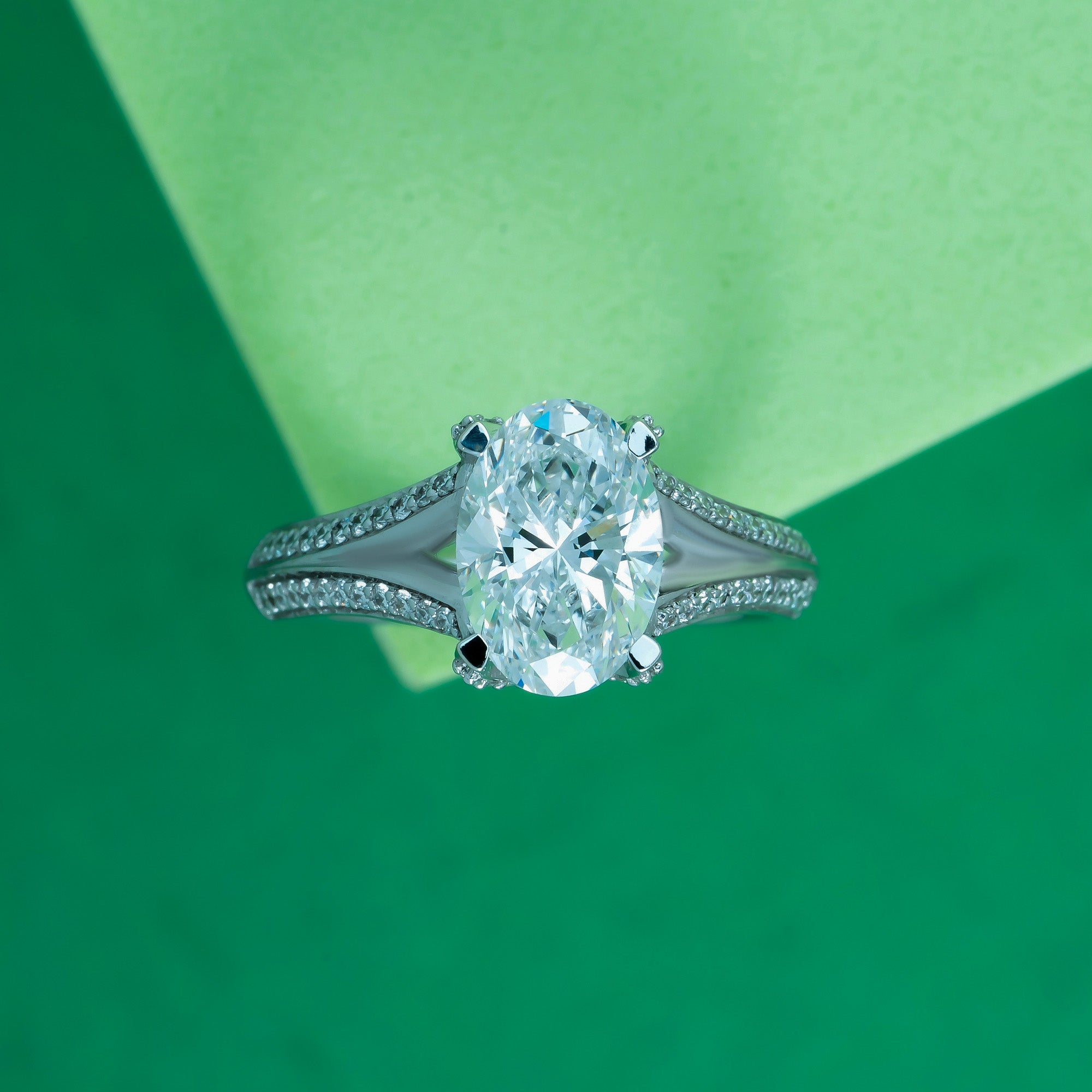 Split Shank Oval Side Stone Engagement Ring