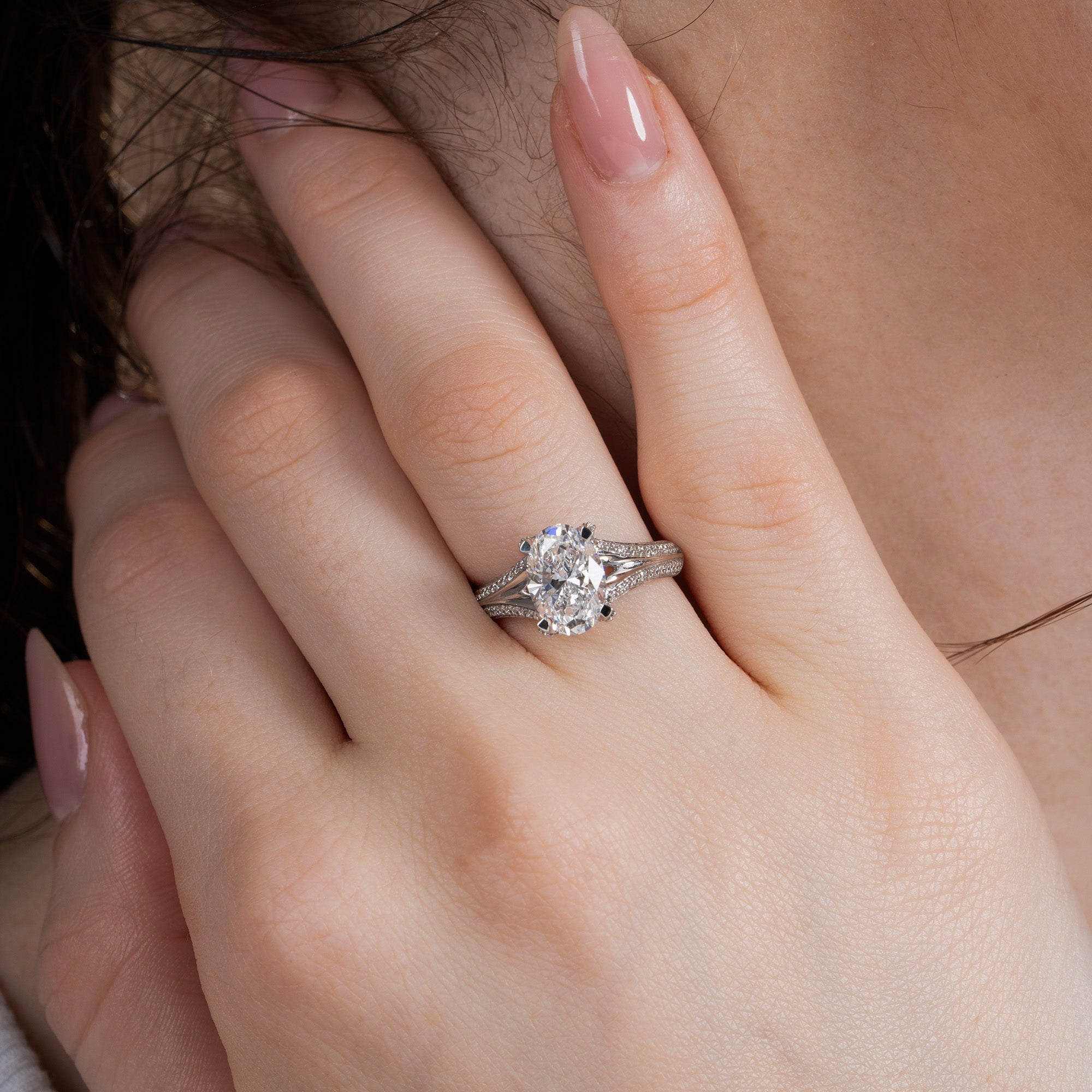 Split Shank Oval Side Stone Engagement Ring