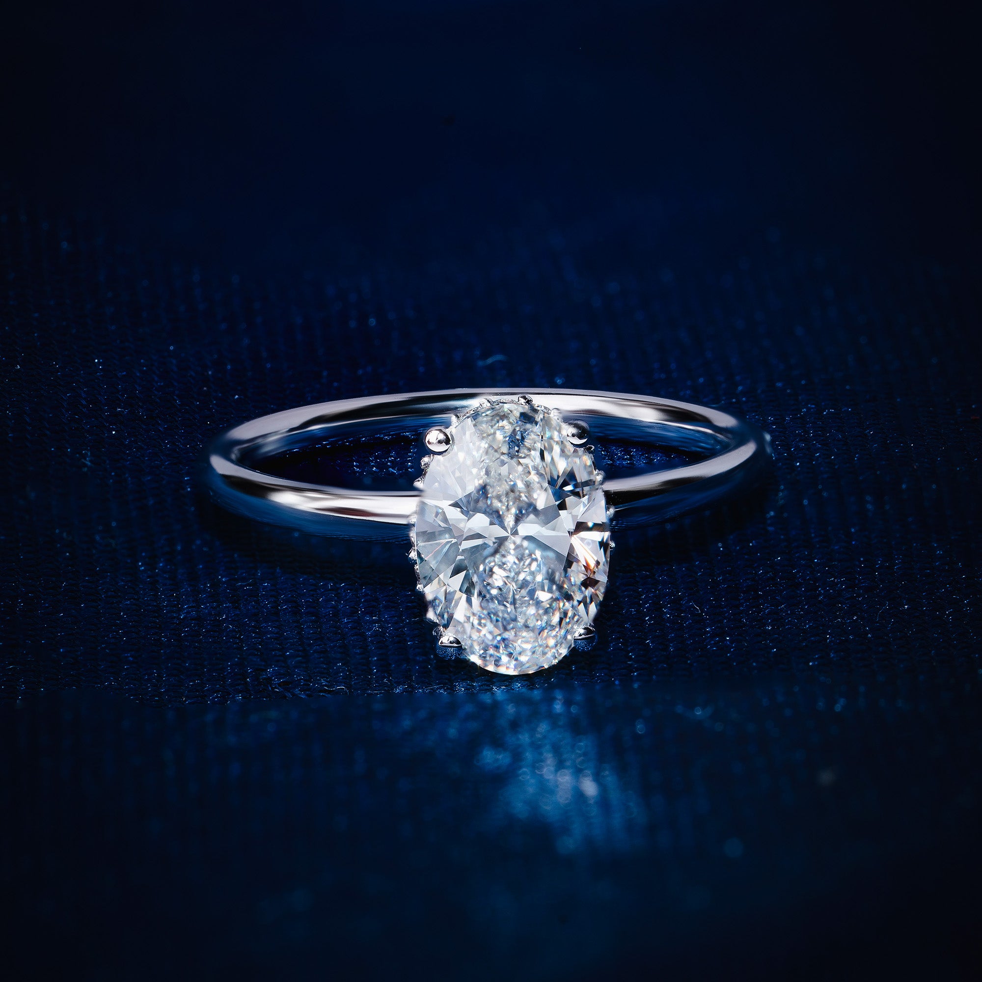 Oval Hidden Halo Solitaire Ring