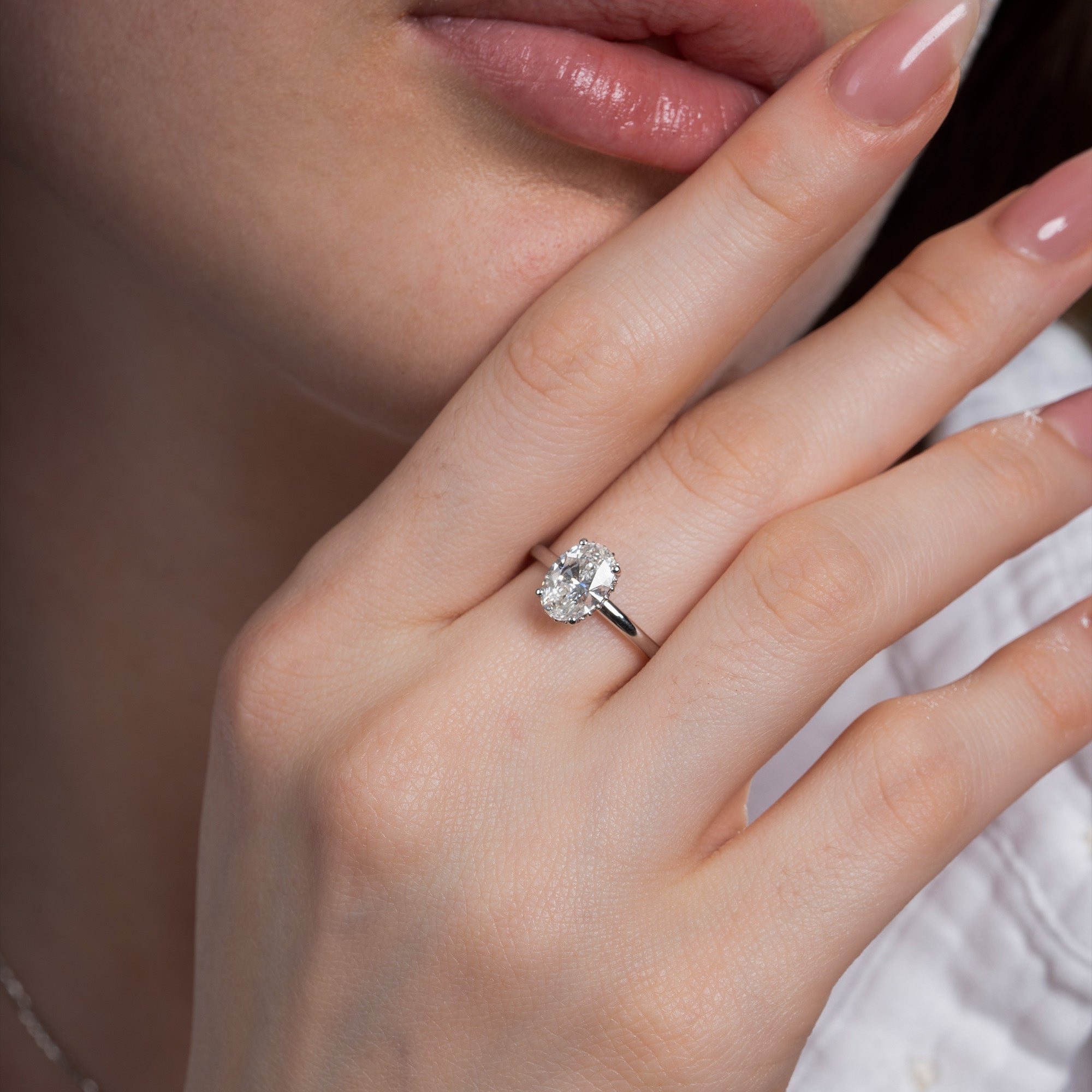 Oval Hidden Halo Solitaire Ring