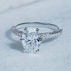 Six Prong Oval Side Stone Engagement Ring
