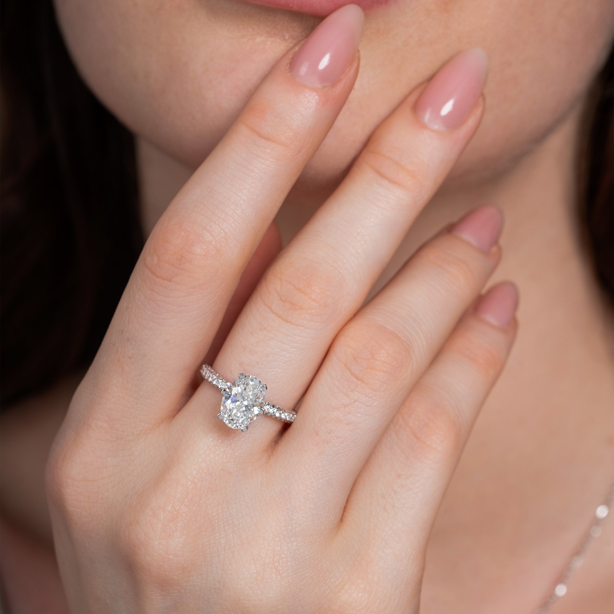 Six Prong Oval Side Stone Engagement Ring