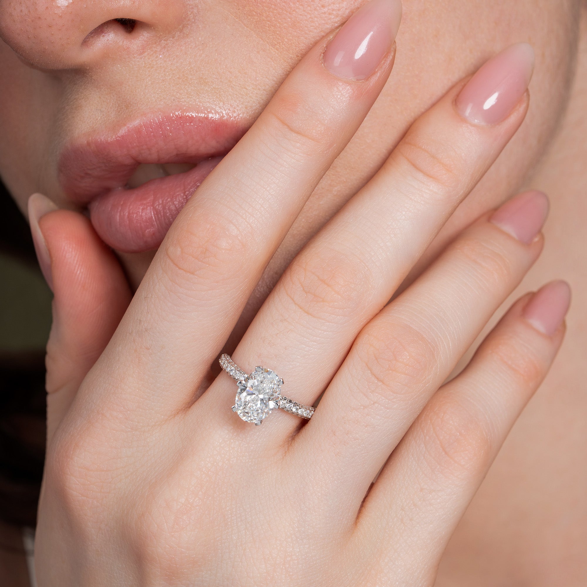 Six Prong Oval Side Stone Engagement Ring