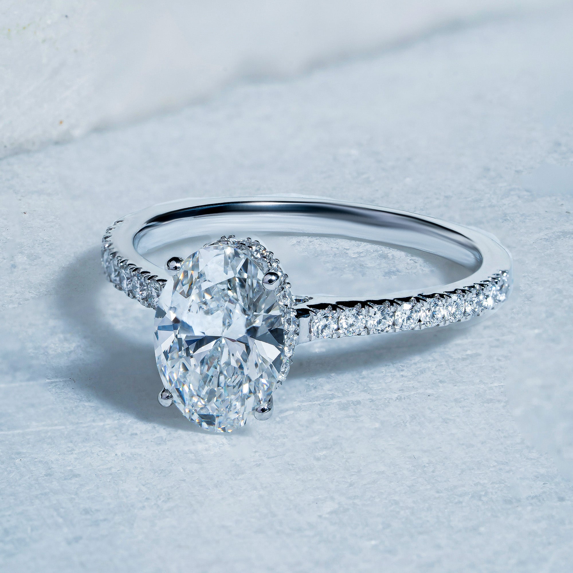 Oval Hidden Halo Engagement Ring