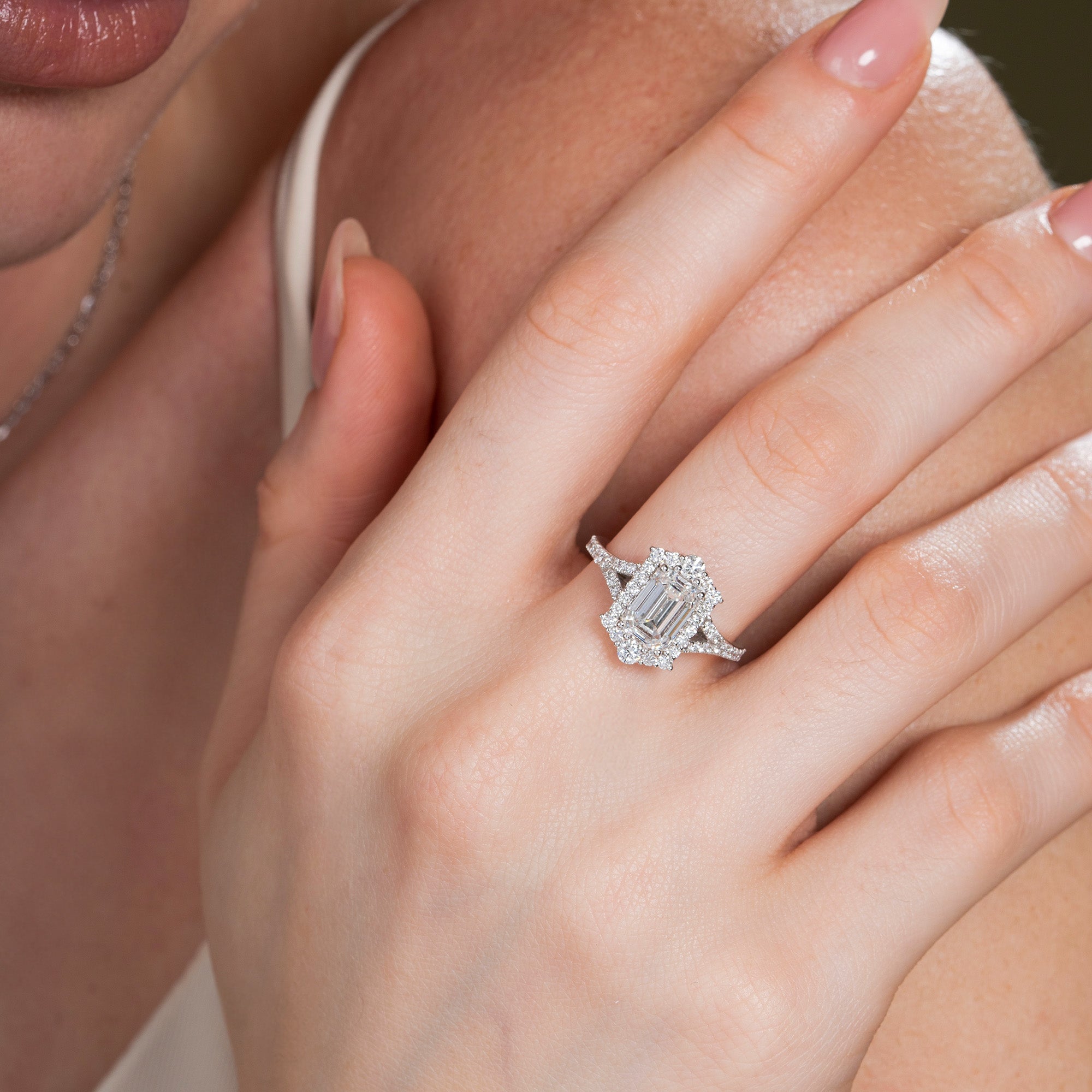 Halo Split Shank Emerald Engagement Ring