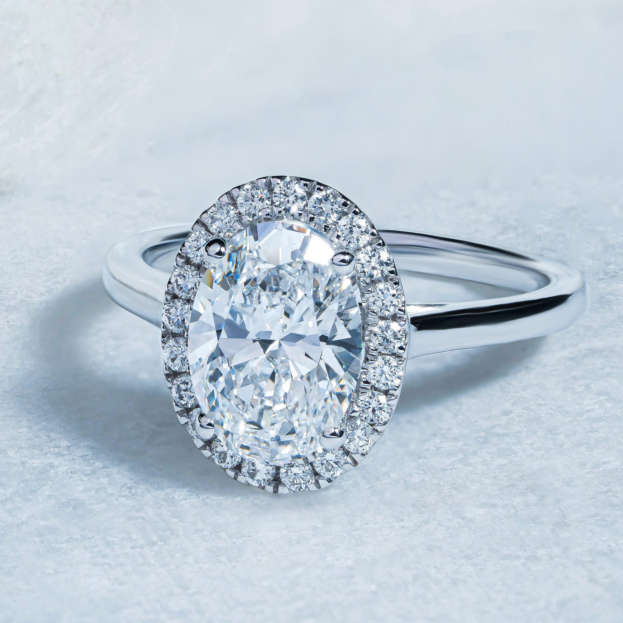 Infinite Oval Halo Engagement Ring