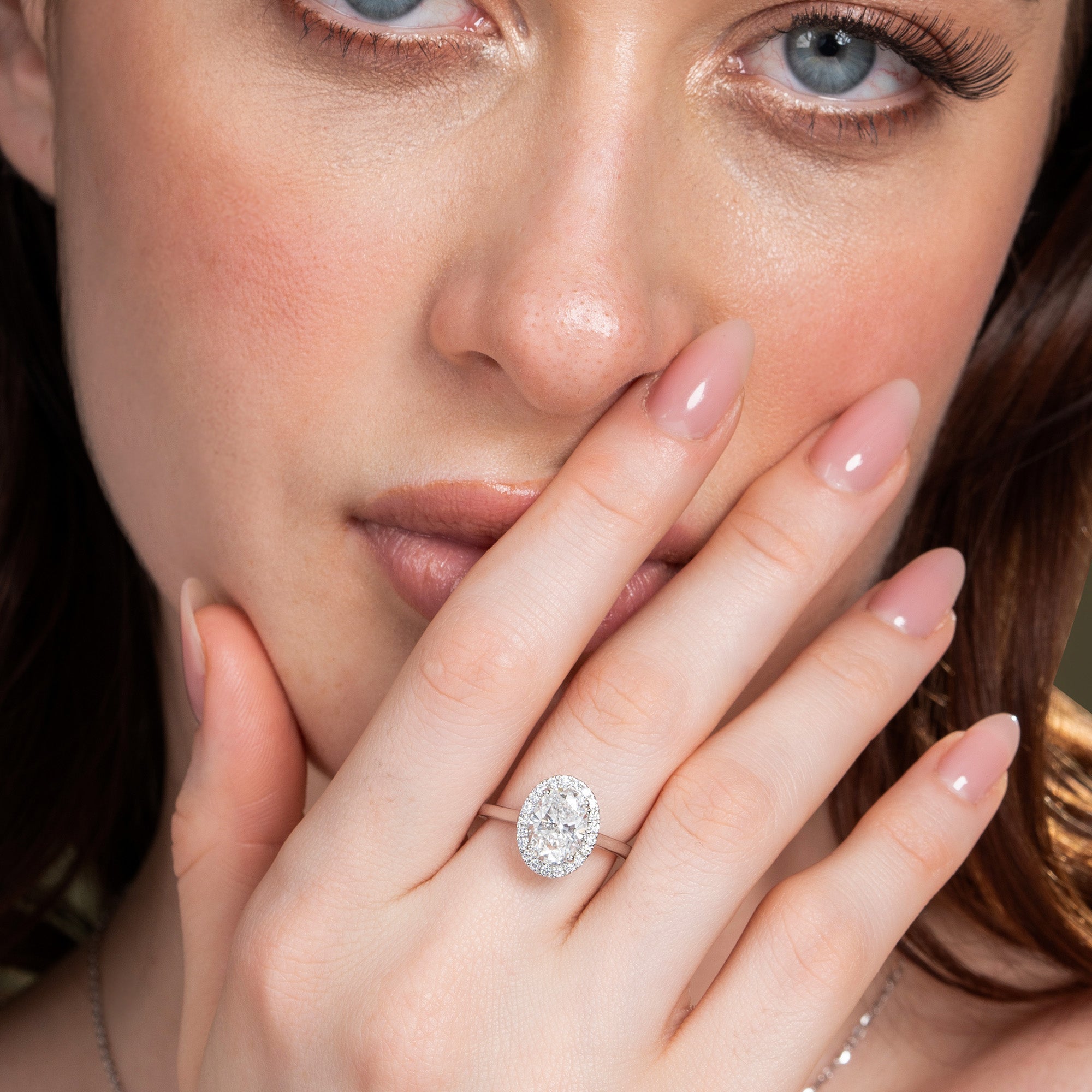 Infinite Oval Halo Engagement Ring