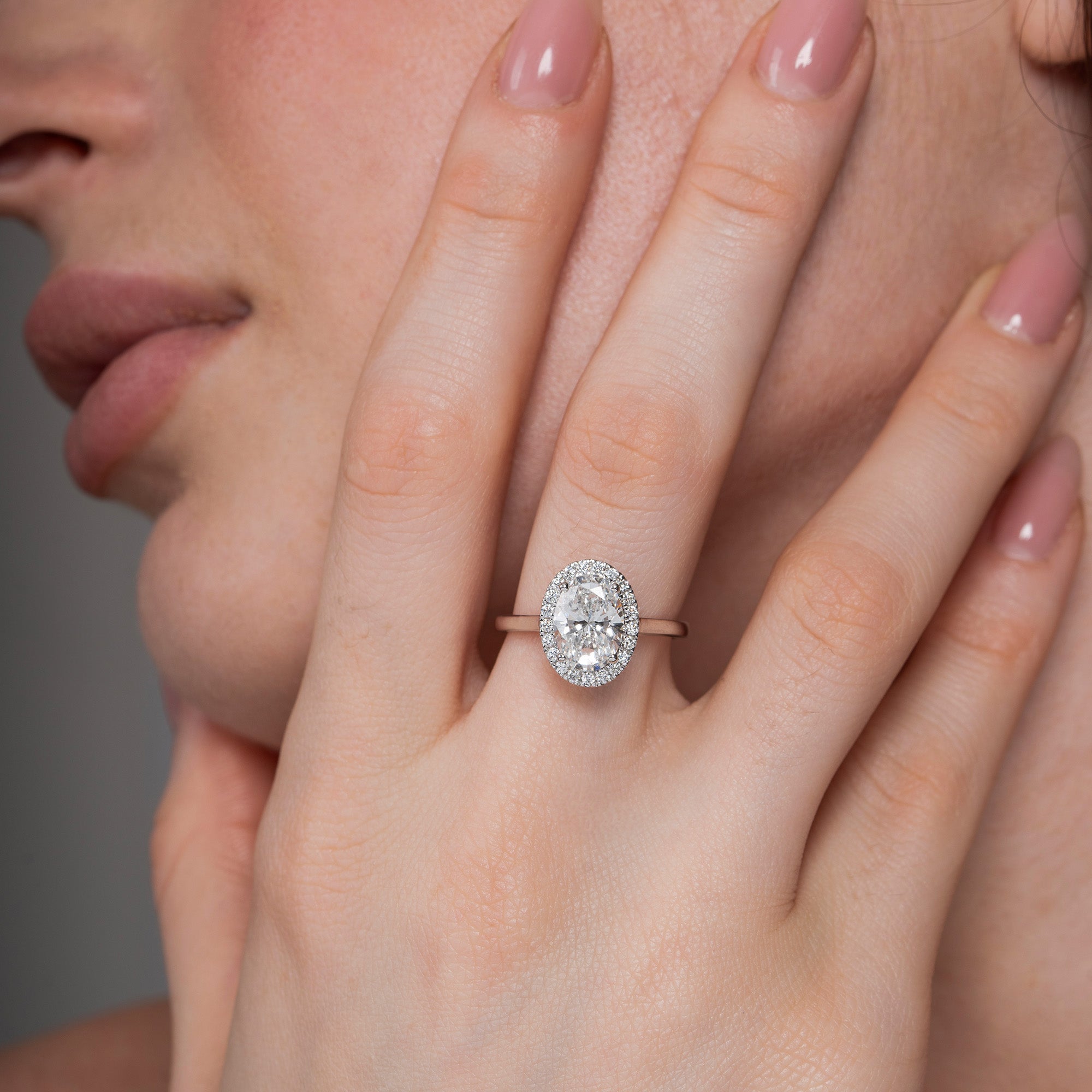 Infinite Oval Halo Engagement Ring