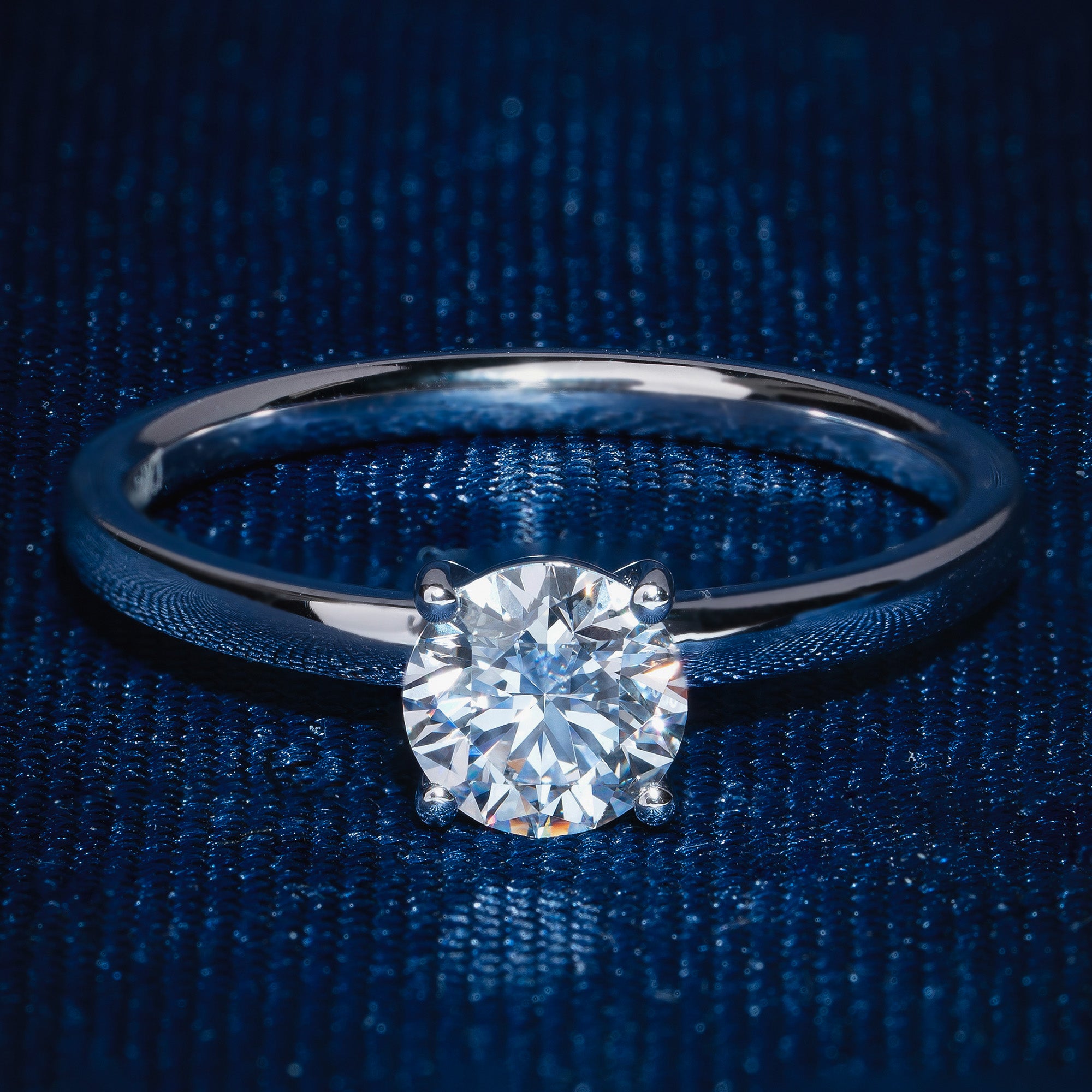 Classical Four Prong Round Engagement Solitaire Ring