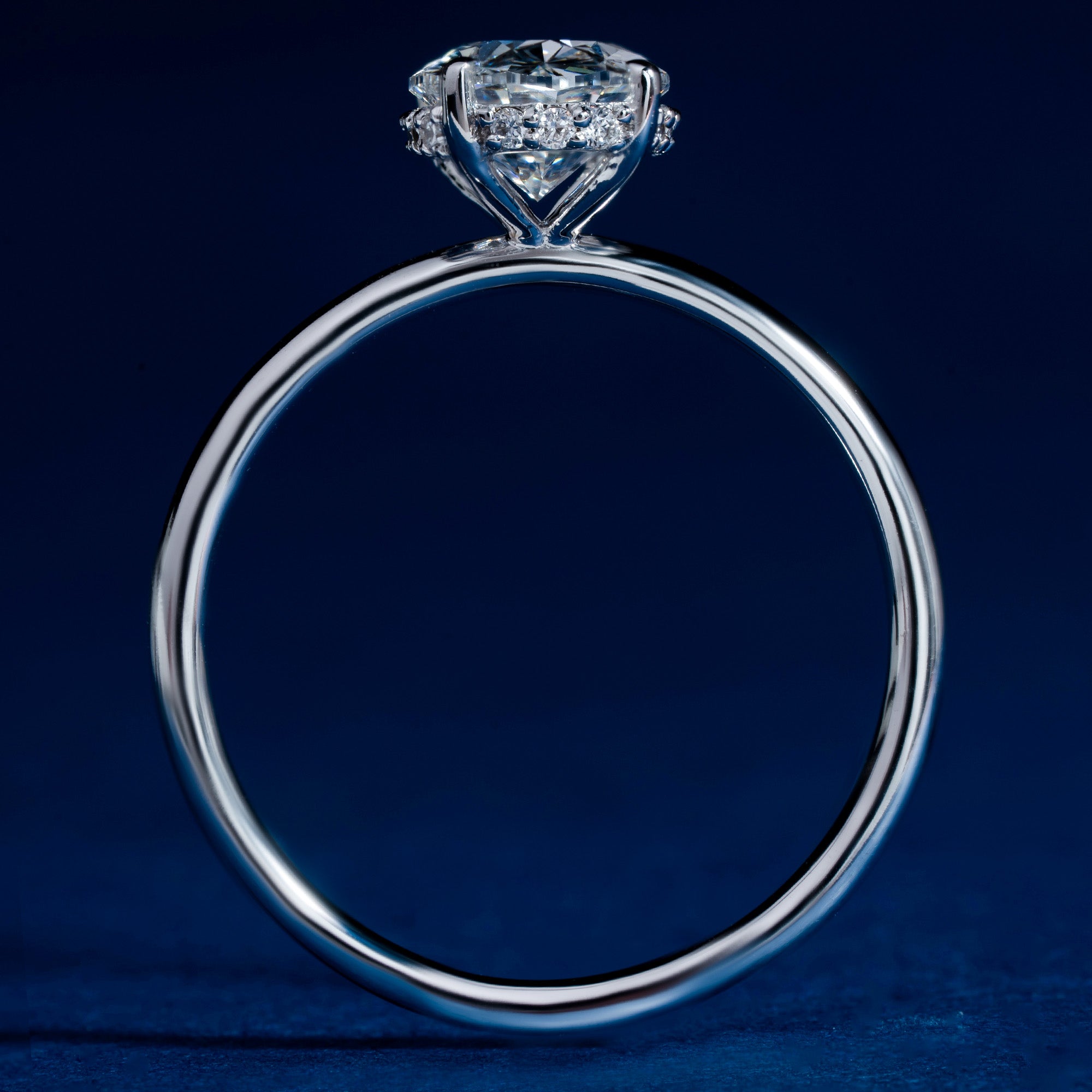 Classical Four Prong Round Engagement Solitaire Ring
