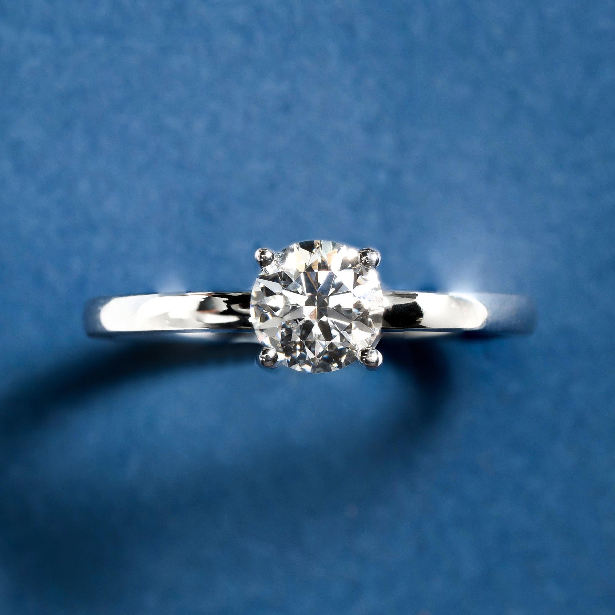 Classical Four Prong Round Engagement Solitaire Ring