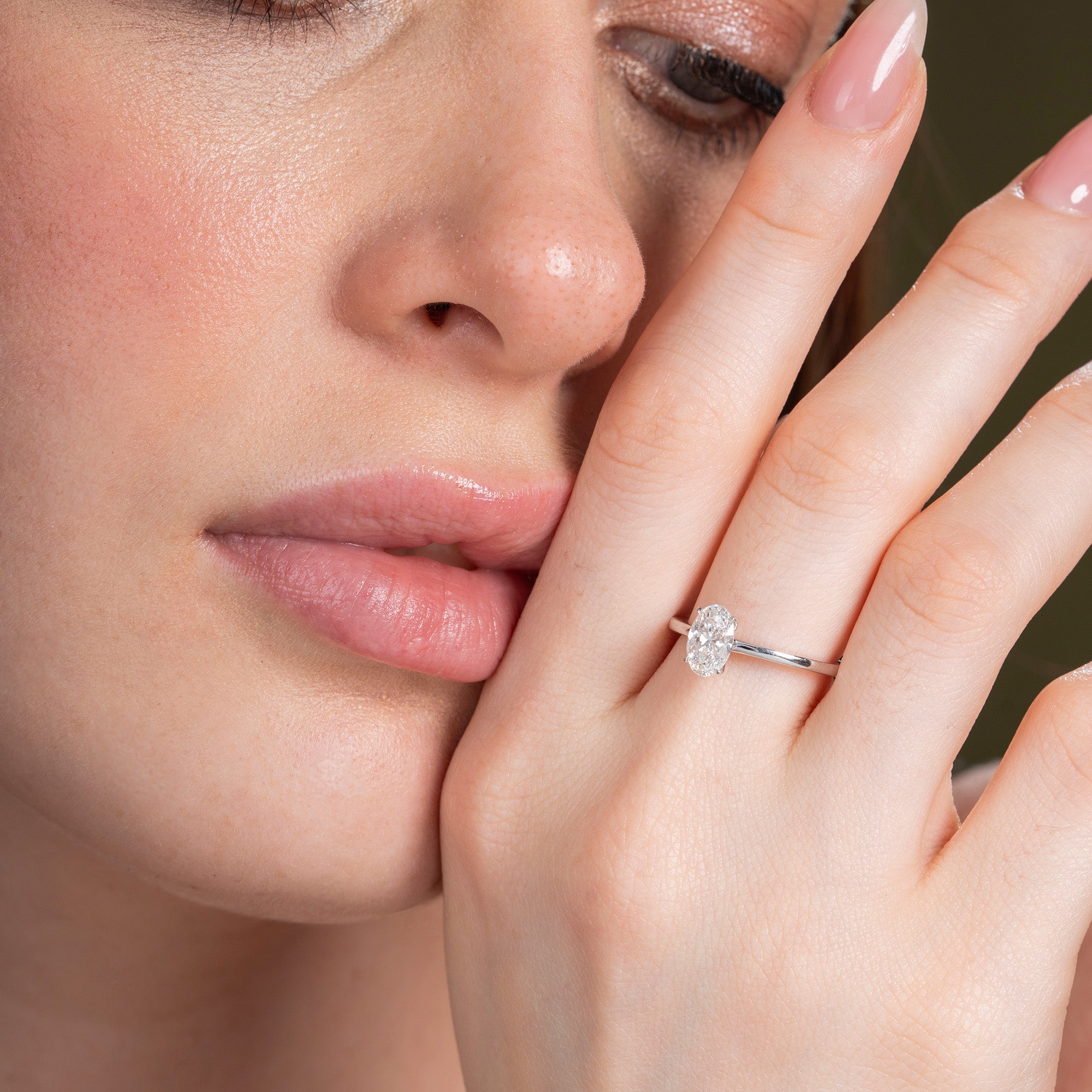 Classical Four Prong Oval Engagement Ring