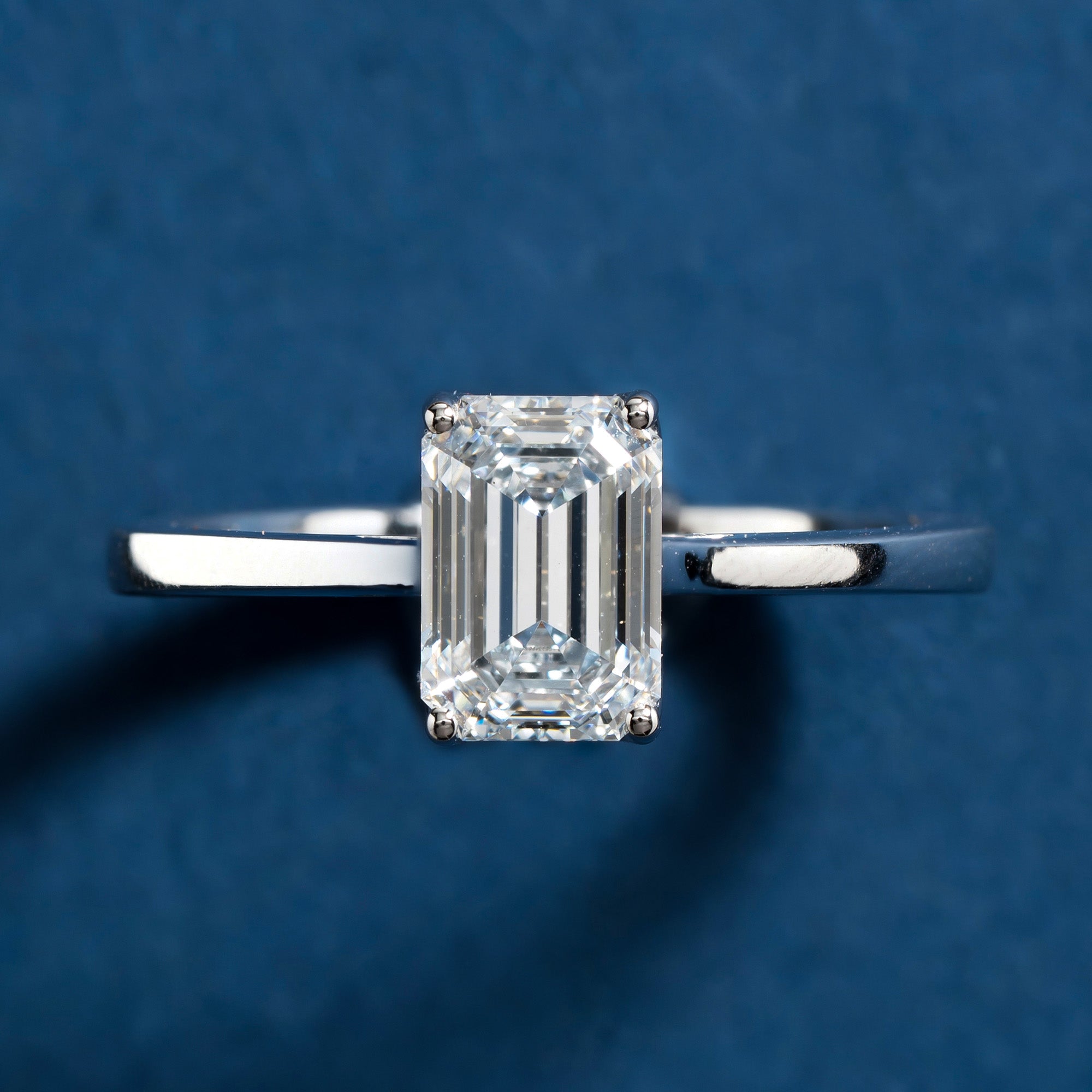 Lotus Prong Emerald Solitaire Ring