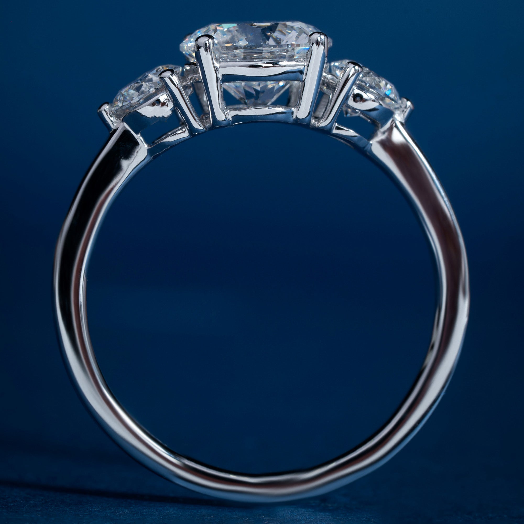 Classical Three Stone Round Engagement Ring