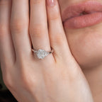 Sparkling Three Stone Emerald Engagement Ring