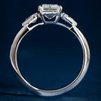 Sparkling Three Stone Emerald Engagement Ring