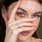 Sparkling Three Stone Emerald Engagement Ring