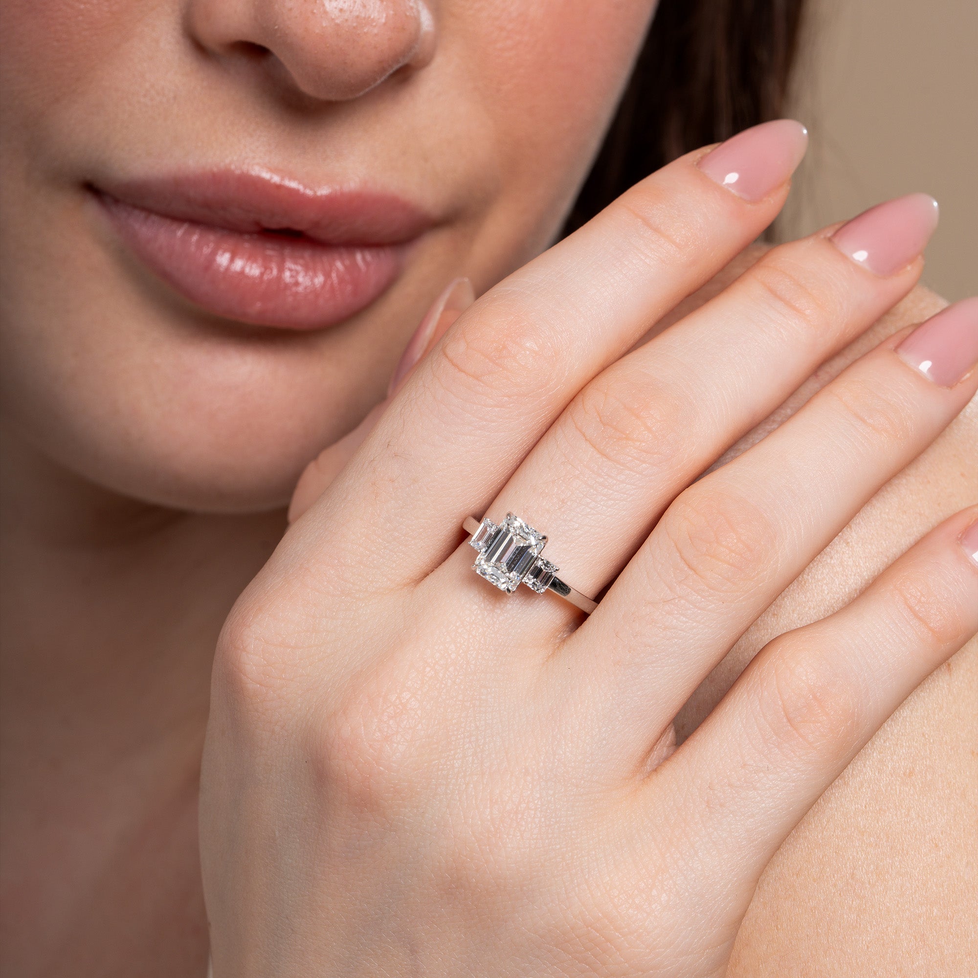 Glazing Three Stone Emerald Engagement Ring