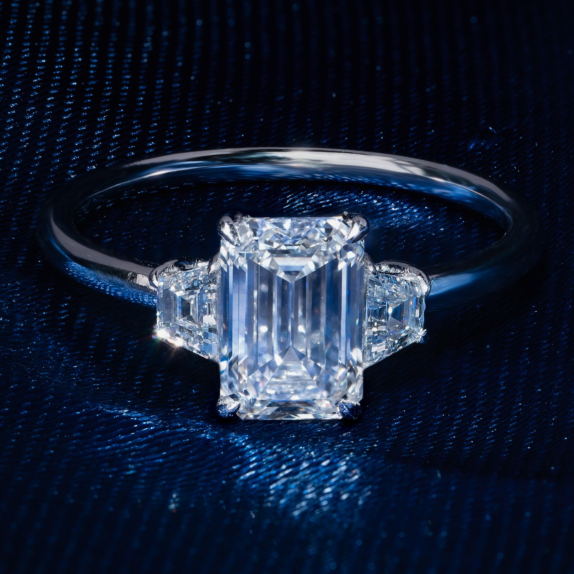 Burning Three Stone Emerald Engagement Ring