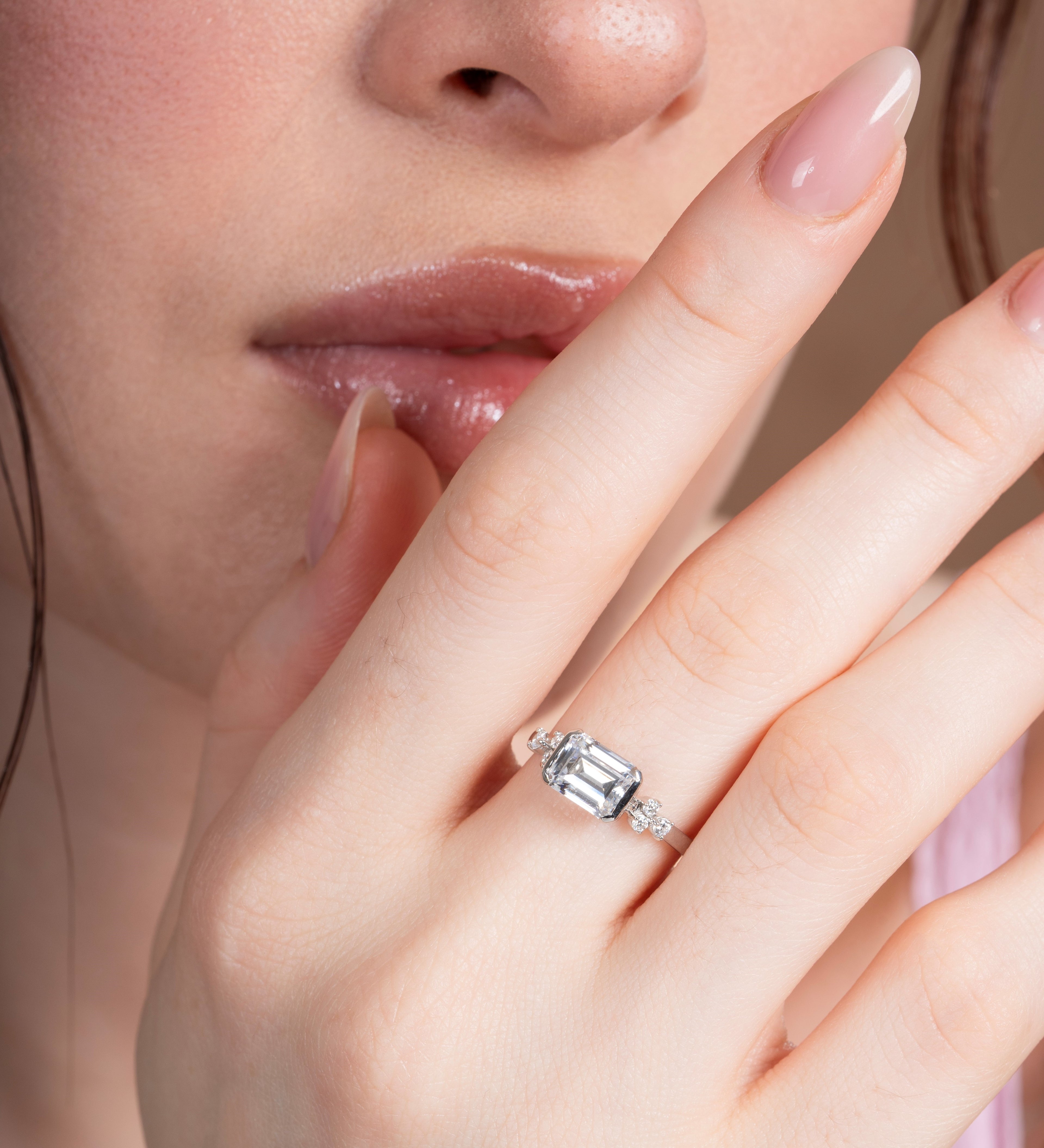 East-West Emerald Engagement Ring