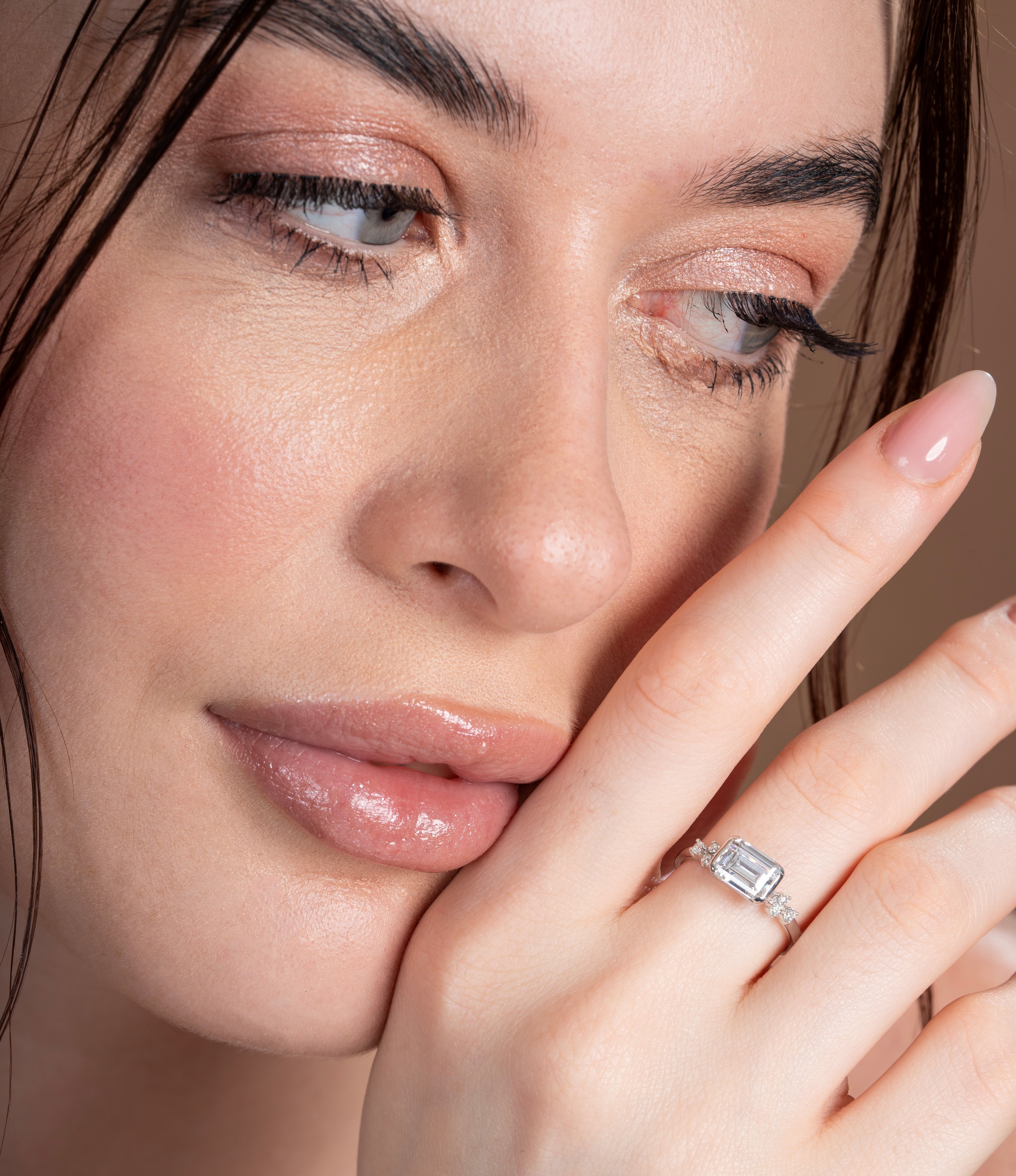 East-West Emerald Engagement Ring