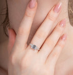 East-West Emerald Engagement Ring