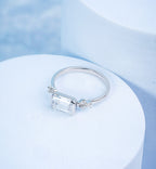 East-West Emerald Engagement Ring