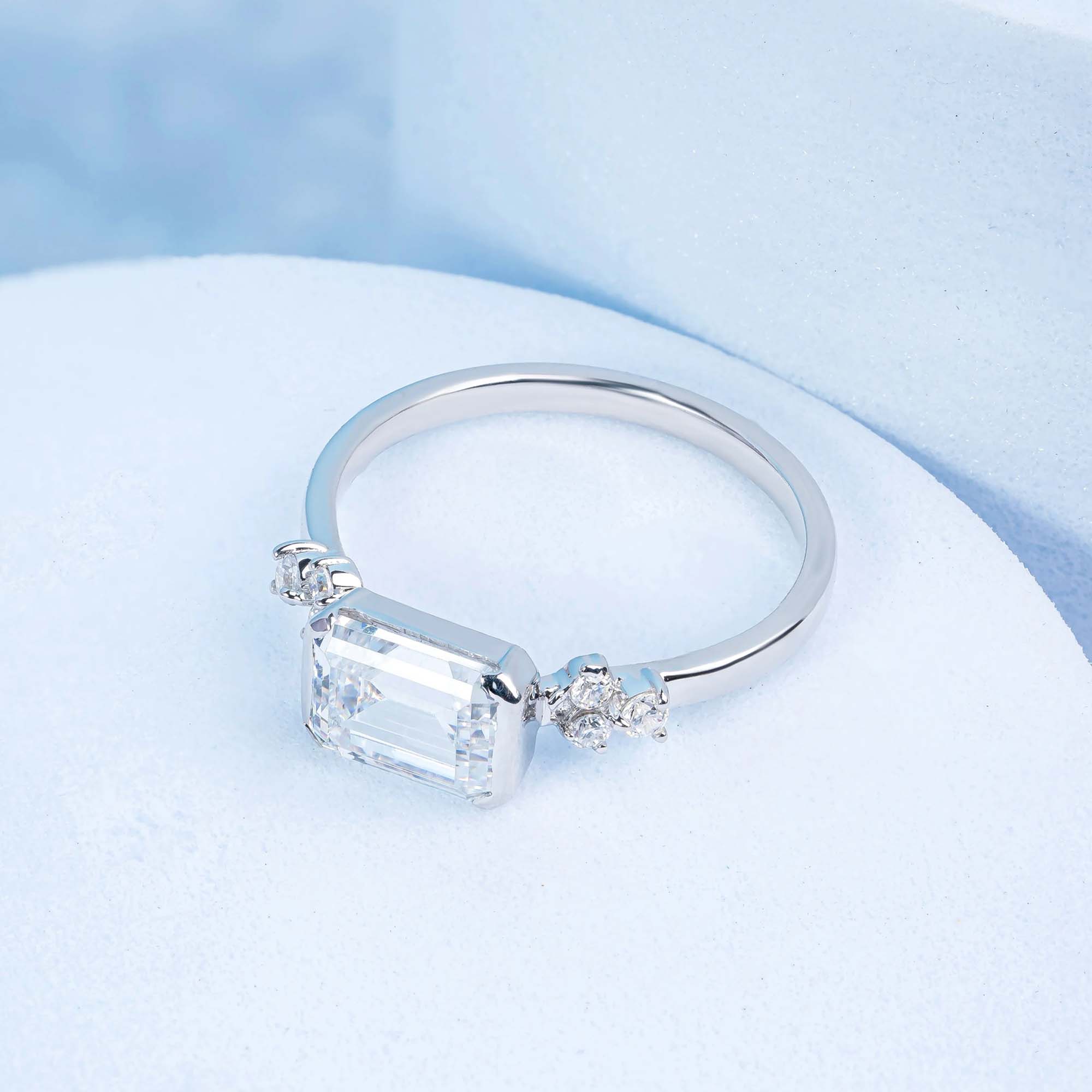 East-West Emerald Engagement Ring