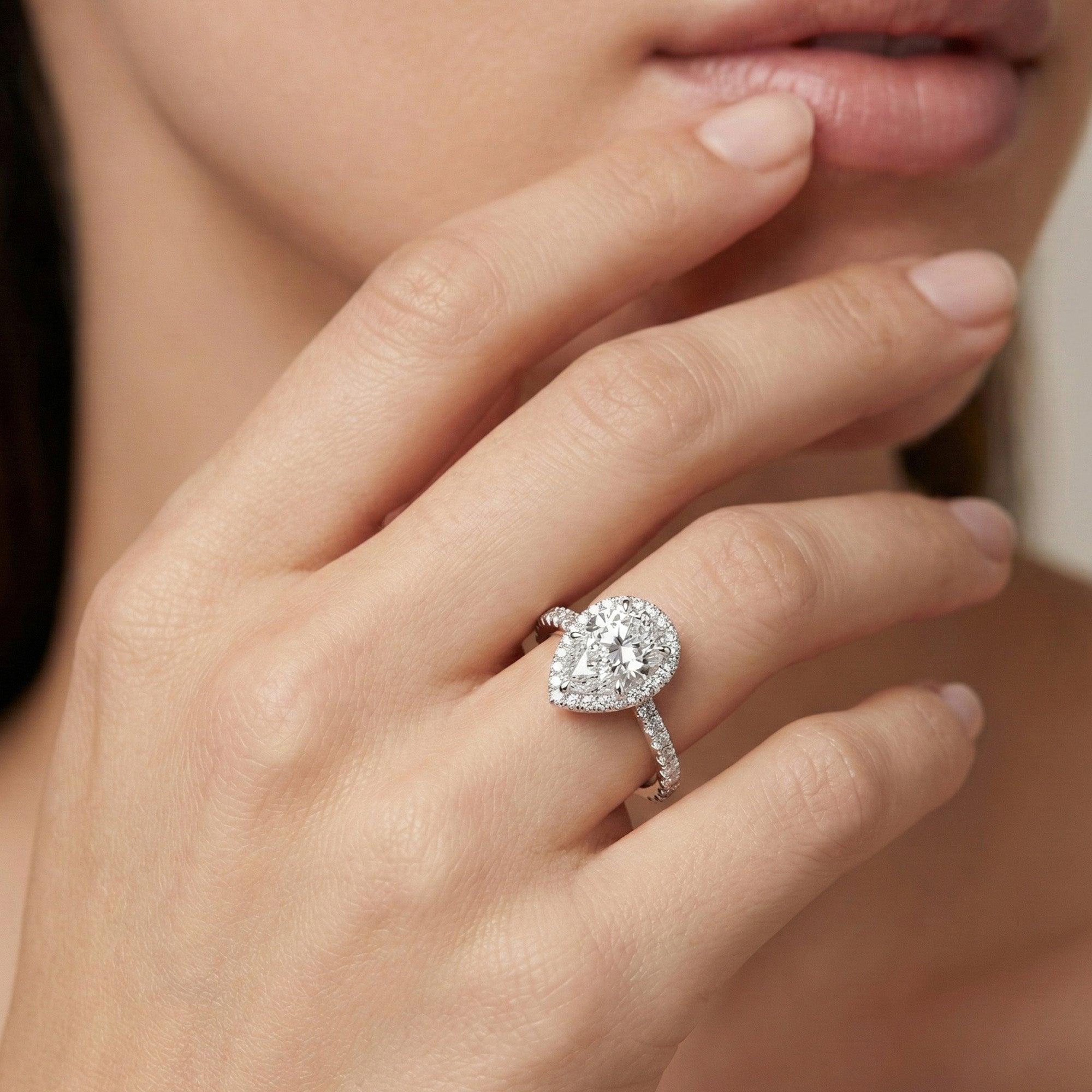 Solitaire Halo Pear Engagement Ring