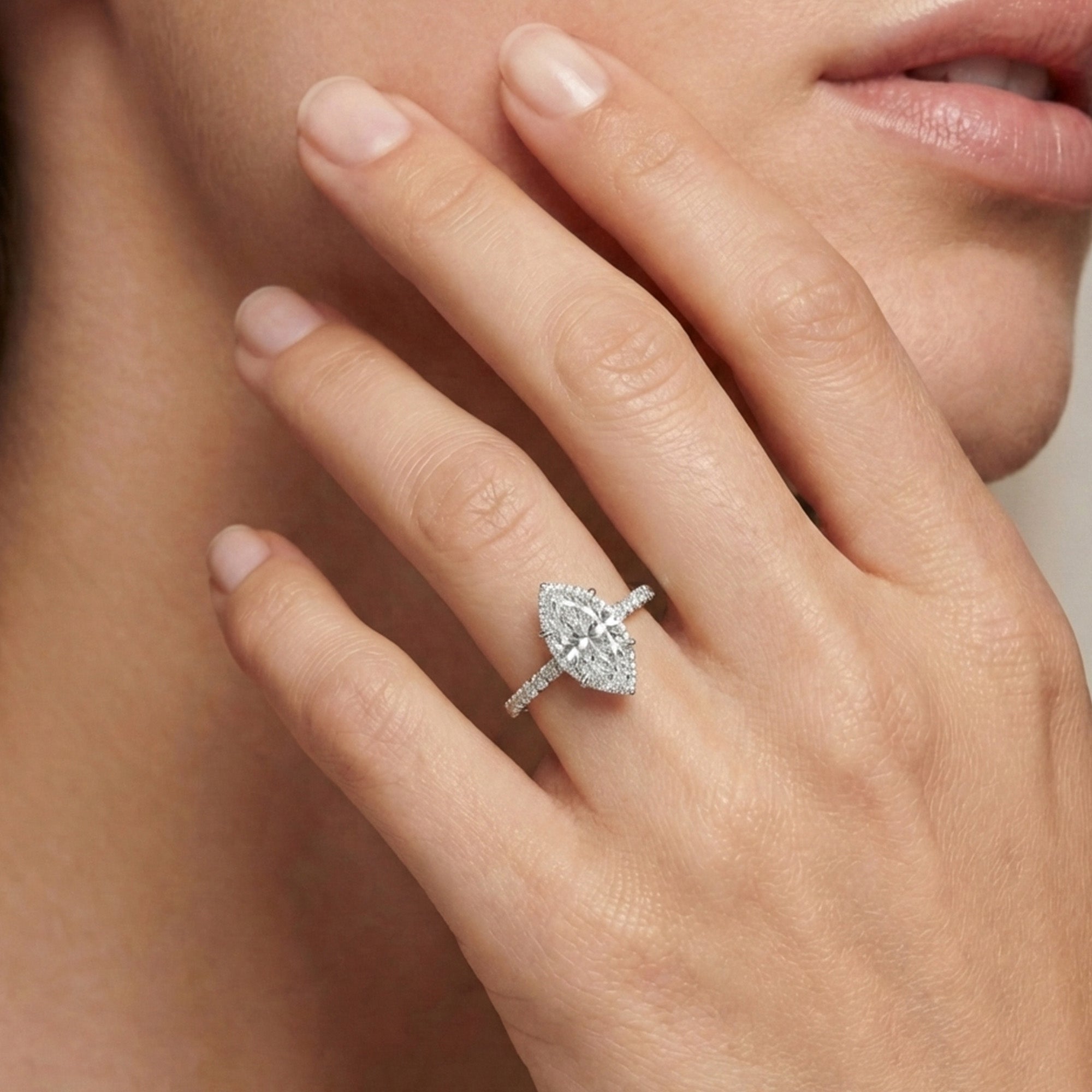Halo Solitaire Marquise Engagement Ring