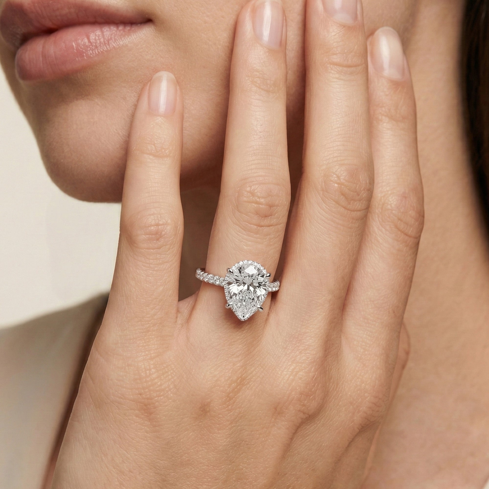 Halo Solitaire Pear Engagement Ring