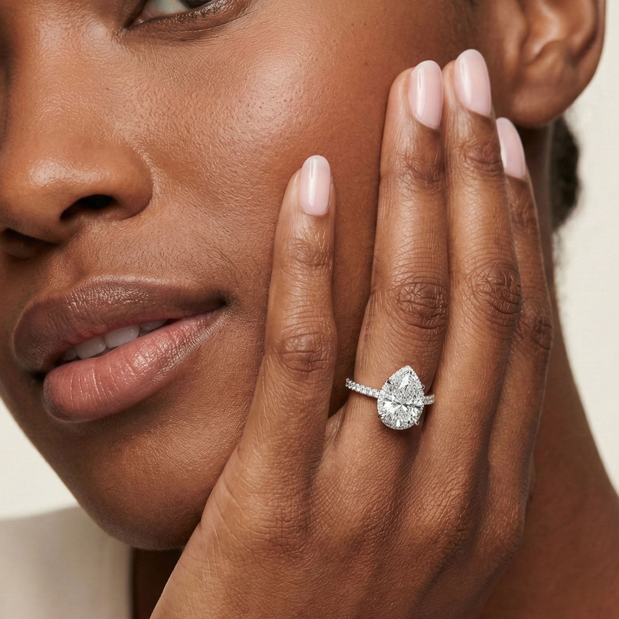 Halo Solitaire Pear Engagement Ring